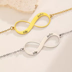 Two infinity-shaped necklaces with engraved names on a light background