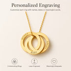 Three interlocking gold rings on a delicate gold chain, shown against a light beige background with promotional text reading 'Personalized Engraving' and feature icons below.